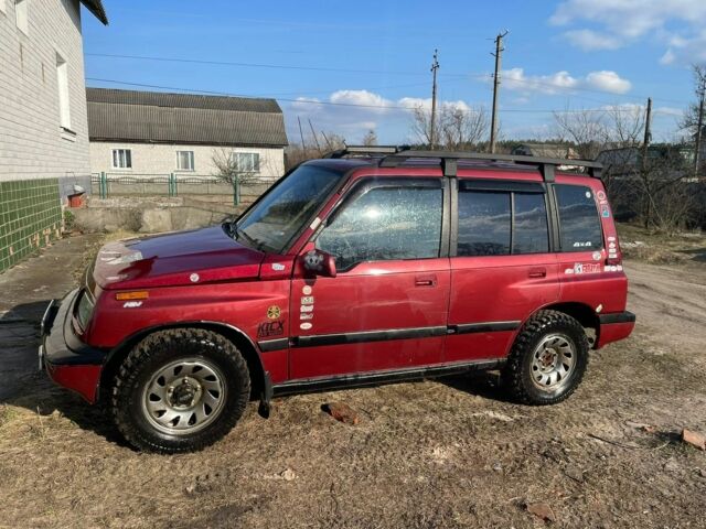 Червоний Сузукі Sidekick, об'ємом двигуна 1.6 л та пробігом 300 тис. км за 3000 $, фото 1 на Automoto.ua