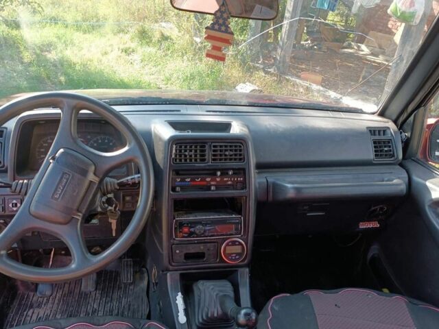 Червоний Сузукі Sidekick, об'ємом двигуна 1.6 л та пробігом 300 тис. км за 3000 $, фото 4 на Automoto.ua