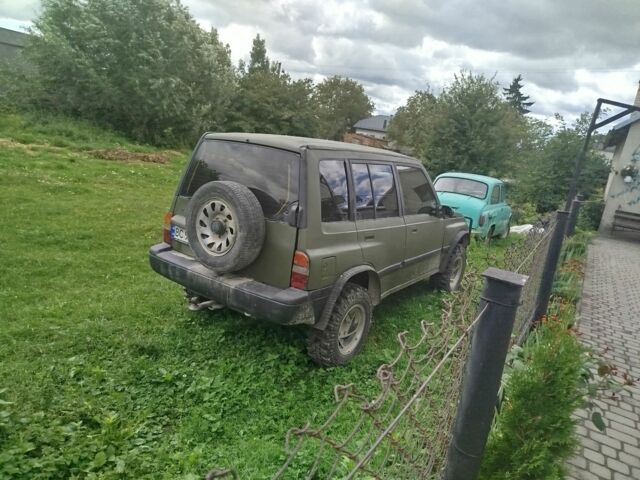 Зелений Сузукі Sidekick, об'ємом двигуна 1.6 л та пробігом 154 тис. км за 4100 $, фото 5 на Automoto.ua