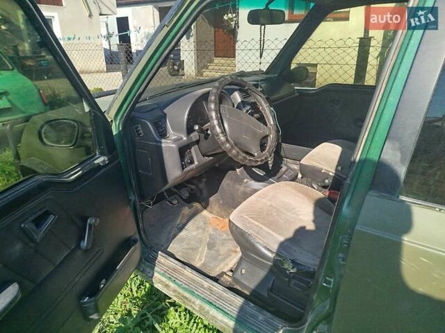 Зеленый Сузуки Sidekick, объемом двигателя 1.59 л и пробегом 154 тыс. км за 4100 $, фото 6 на Automoto.ua