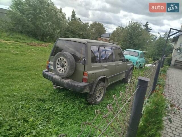 Зеленый Сузуки Sidekick, объемом двигателя 1.59 л и пробегом 154 тыс. км за 4100 $, фото 2 на Automoto.ua