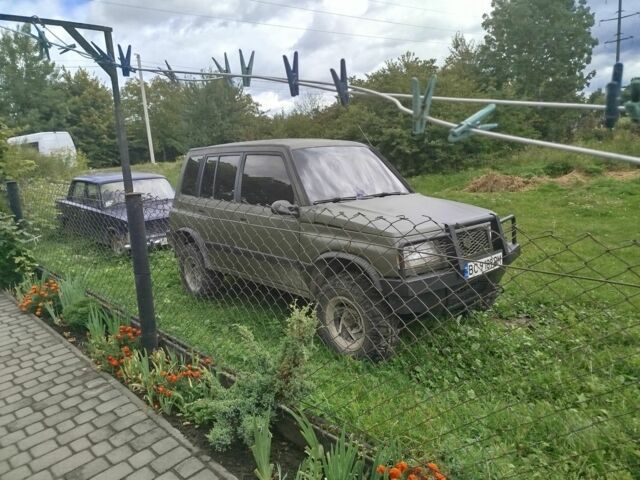 Зелений Сузукі Sidekick, об'ємом двигуна 1.6 л та пробігом 154 тис. км за 4100 $, фото 6 на Automoto.ua