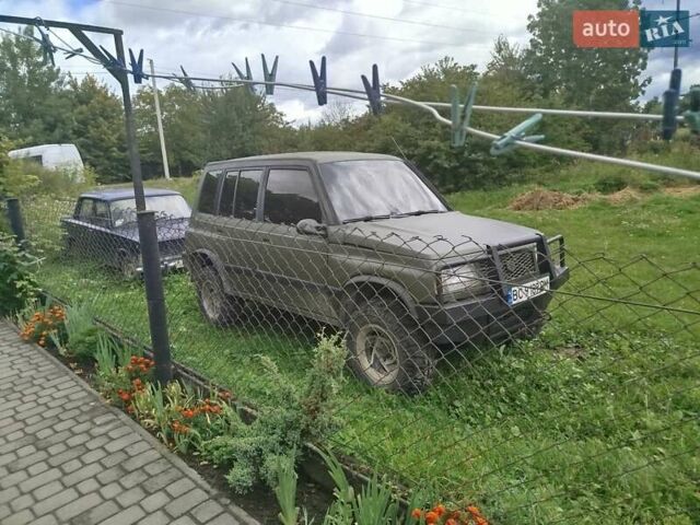 Зеленый Сузуки Sidekick, объемом двигателя 1.59 л и пробегом 154 тыс. км за 4100 $, фото 1 на Automoto.ua