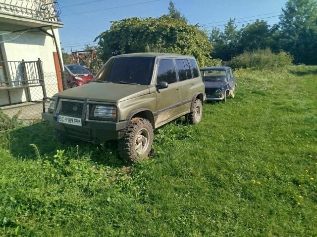 Зелений Сузукі Sidekick, об'ємом двигуна 1.6 л та пробігом 154 тис. км за 4100 $, фото 2 на Automoto.ua