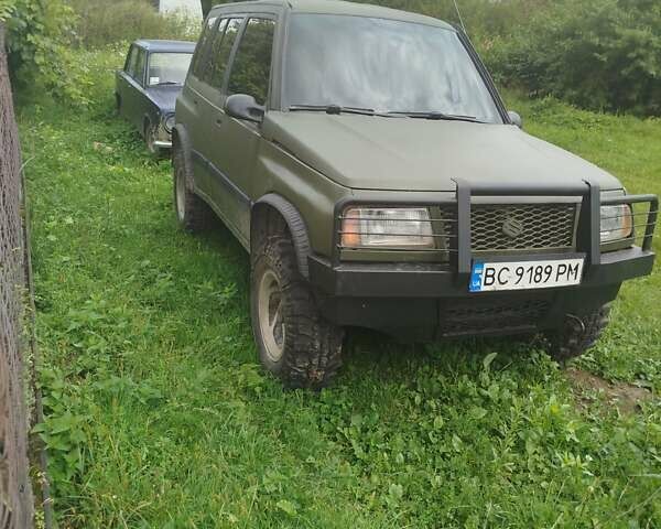 Зеленый Сузуки Sidekick, объемом двигателя 1.59 л и пробегом 154 тыс. км за 4100 $, фото 7 на Automoto.ua