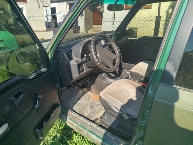 Зелений Сузукі Sidekick, об'ємом двигуна 1.6 л та пробігом 154 тис. км за 4100 $, фото 4 на Automoto.ua