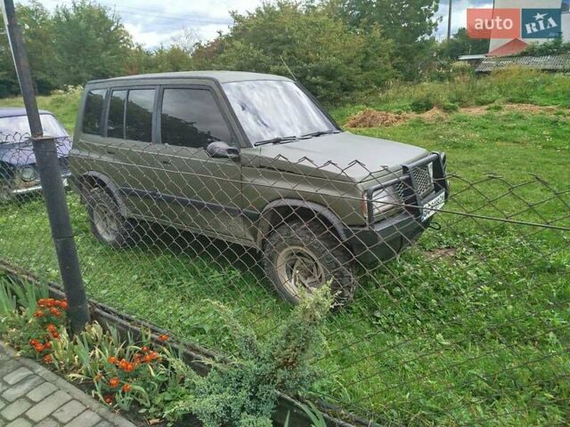 Зеленый Сузуки Sidekick, объемом двигателя 1.59 л и пробегом 154 тыс. км за 4100 $, фото 8 на Automoto.ua