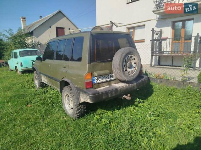 Зеленый Сузуки Sidekick, объемом двигателя 1.59 л и пробегом 154 тыс. км за 4100 $, фото 3 на Automoto.ua