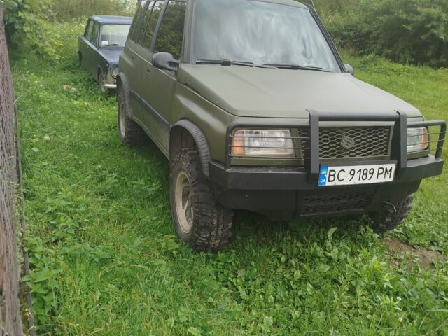 Зелений Сузукі Sidekick, об'ємом двигуна 1.6 л та пробігом 154 тис. км за 4100 $, фото 7 на Automoto.ua