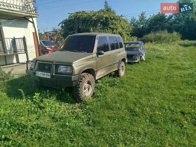 Зеленый Сузуки Sidekick, объемом двигателя 1.59 л и пробегом 154 тыс. км за 4100 $, фото 9 на Automoto.ua