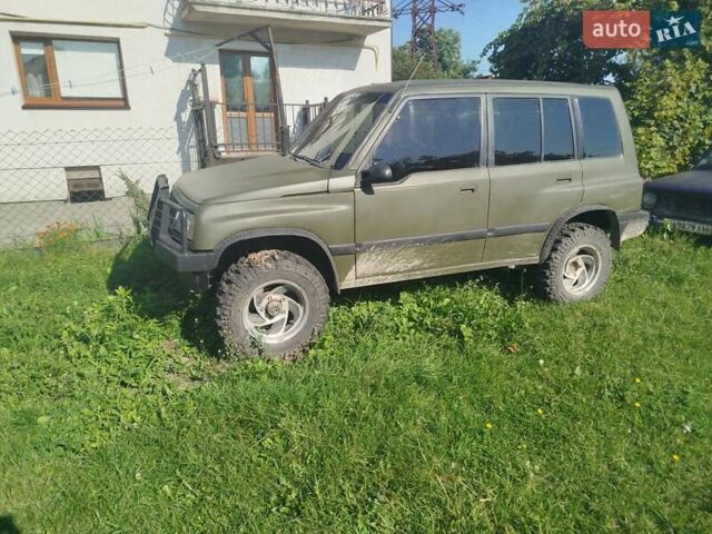 Зеленый Сузуки Sidekick, объемом двигателя 1.59 л и пробегом 154 тыс. км за 4100 $, фото 5 на Automoto.ua