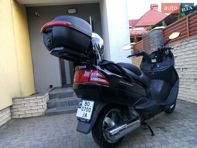 Черный Сузуки Skywave 250, объемом двигателя 0.25 л и пробегом 49 тыс. км за 1750 $, фото 1 на Automoto.ua