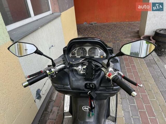 Черный Сузуки Skywave 250, объемом двигателя 0 л и пробегом 30 тыс. км за 2000 $, фото 5 на Automoto.ua