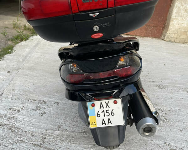 Черный Сузуки Skywave 250, объемом двигателя 0 л и пробегом 23 тыс. км за 1900 $, фото 1 на Automoto.ua