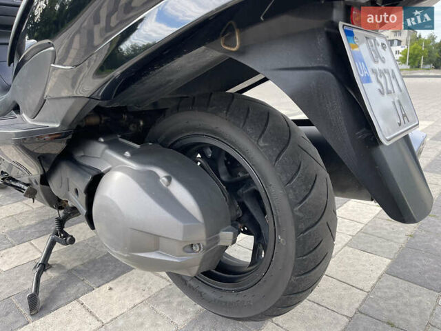 Черный Сузуки Skywave 250, объемом двигателя 0.25 л и пробегом 27 тыс. км за 2649 $, фото 9 на Automoto.ua