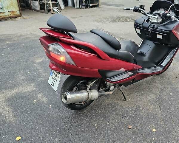 Красный Сузуки Skywave 250, объемом двигателя 0.25 л и пробегом 29 тыс. км за 1800 $, фото 4 на Automoto.ua