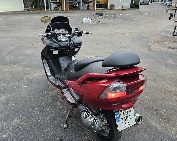 Красный Сузуки Skywave 250, объемом двигателя 0.25 л и пробегом 29 тыс. км за 1800 $, фото 8 на Automoto.ua