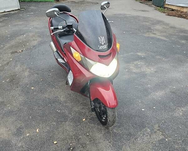 Красный Сузуки Skywave 250, объемом двигателя 0.25 л и пробегом 29 тыс. км за 1800 $, фото 7 на Automoto.ua