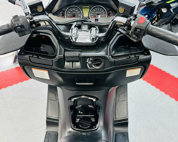 Синий Сузуки Skywave 250, объемом двигателя 0.25 л и пробегом 30 тыс. км за 2400 $, фото 14 на Automoto.ua