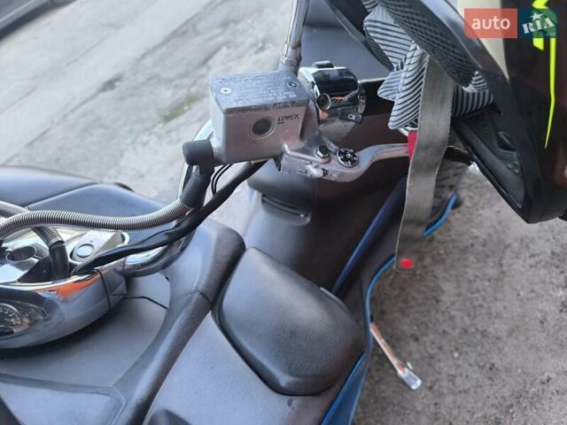 Синий Сузуки Skywave 250, объемом двигателя 0.25 л и пробегом 42 тыс. км за 1700 $, фото 6 на Automoto.ua