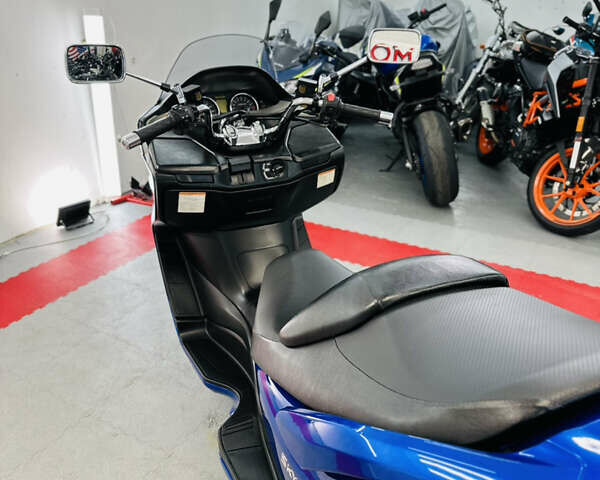 Синий Сузуки Skywave 250, объемом двигателя 0.25 л и пробегом 30 тыс. км за 2400 $, фото 18 на Automoto.ua