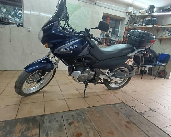 Синий Сузуки XF 650 Freewind, объемом двигателя 0.65 л и пробегом 50 тыс. км за 3500 $, фото 4 на Automoto.ua