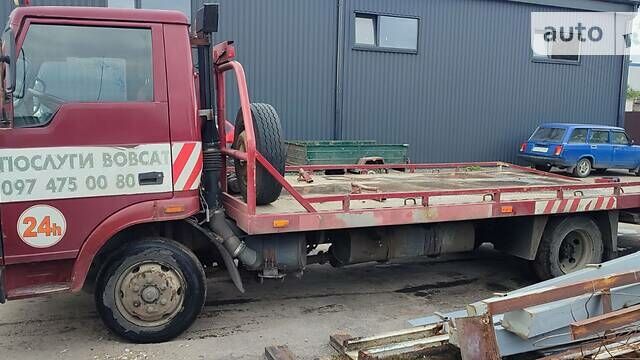 Красный TATA LPT 613, объемом двигателя 5.7 л и пробегом 127 тыс. км за 8200 $, фото 2 на Automoto.ua