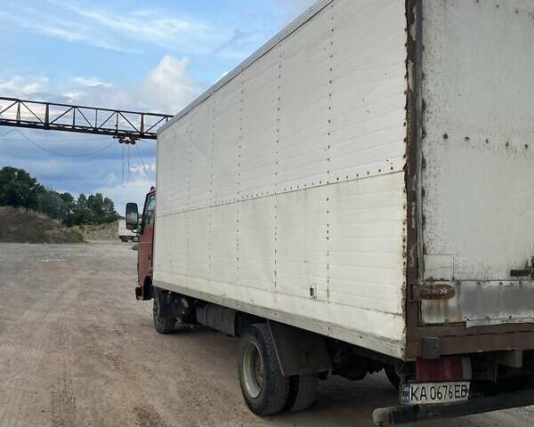 Червоний TATA LPT 613, об'ємом двигуна 5.68 л та пробігом 251 тис. км за 5500 $, фото 1 на Automoto.ua
