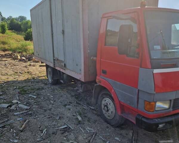 Красный TATA LPT 613, объемом двигателя 6 л и пробегом 300 тыс. км за 5000 $, фото 4 на Automoto.ua
