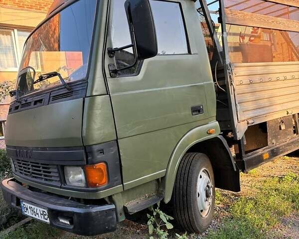 Зеленый TATA LPT 613, объемом двигателя 5.67 л и пробегом 400 тыс. км за 6500 $, фото 2 на Automoto.ua