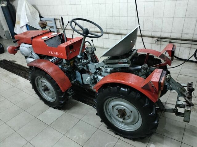 Красный ТЗ 4k-14, объемом двигателя 2 л и пробегом 100 тыс. км за 4000 $, фото 2 на Automoto.ua