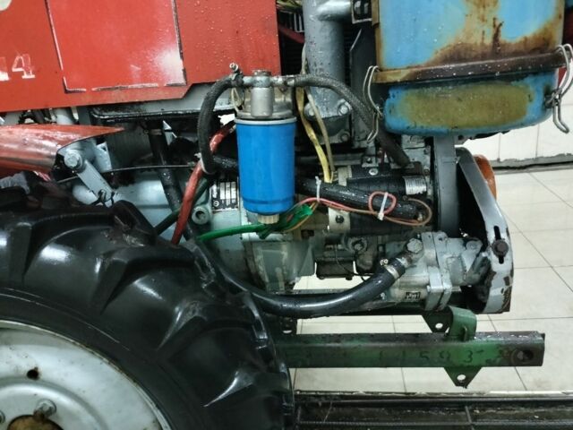 Красный ТЗ 4k-14, объемом двигателя 2 л и пробегом 100 тыс. км за 4000 $, фото 5 на Automoto.ua