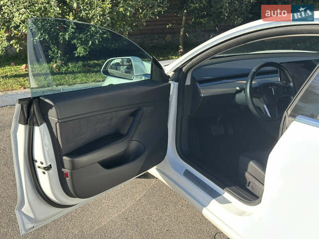 Білий Тесла Модель 3, об'ємом двигуна 0 л та пробігом 94 тис. км за 16800 $, фото 23 на Automoto.ua