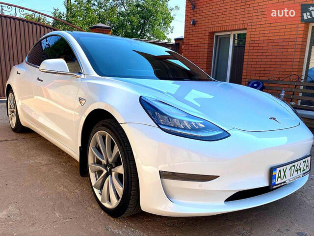 Білий Тесла Модель 3, об'ємом двигуна 0.08 л та пробігом 89 тис. км за 18700 $, фото 2 на Automoto.ua