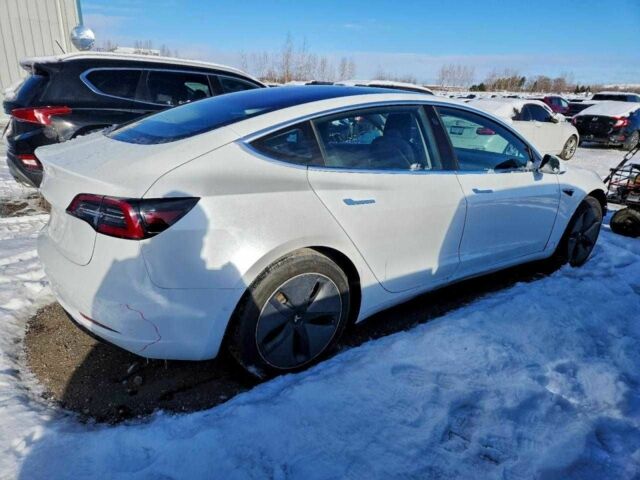 Білий Тесла Модель 3, об'ємом двигуна 0 л та пробігом 65 тис. км за 13500 $, фото 2 на Automoto.ua