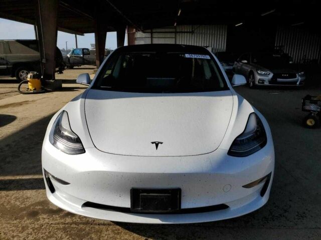 Белый Тесла Модель 3, объемом двигателя 0 л и пробегом 35 тыс. км за 5700 $, фото 4 на Automoto.ua