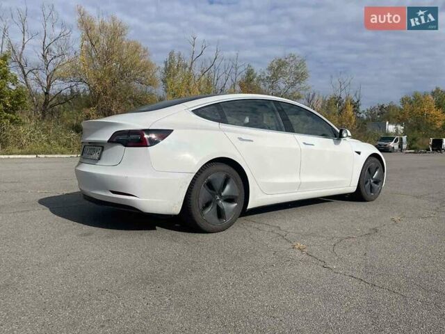 Белый Тесла Модель 3, объемом двигателя 0 л и пробегом 128 тыс. км за 16999 $, фото 4 на Automoto.ua