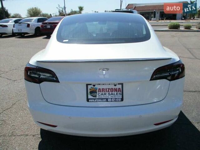 Белый Тесла Модель 3, объемом двигателя 0 л и пробегом 53 тыс. км за 6700 $, фото 3 на Automoto.ua