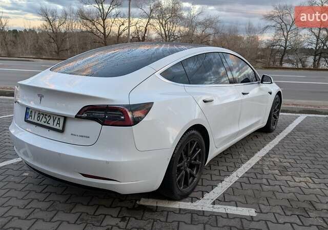 Білий Тесла Модель 3, об'ємом двигуна 0 л та пробігом 143 тис. км за 16700 $, фото 5 на Automoto.ua