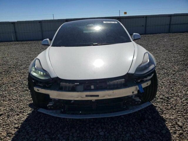 Білий Тесла Модель 3, об'ємом двигуна 0 л та пробігом 41 тис. км за 3995 $, фото 4 на Automoto.ua