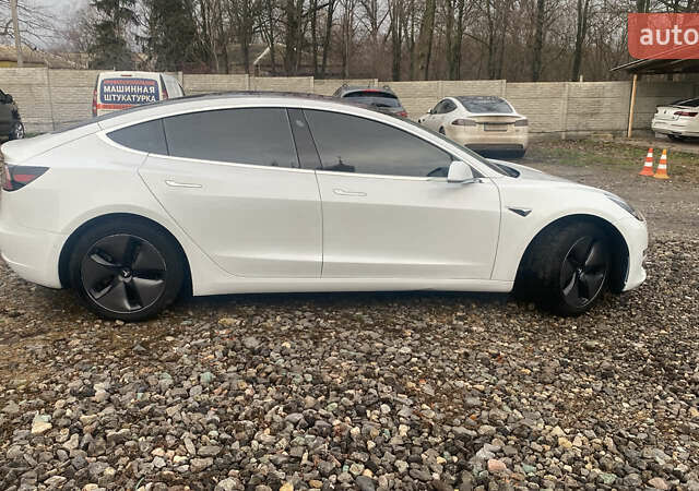 Белый Тесла Модель 3, объемом двигателя 0 л и пробегом 100 тыс. км за 15200 $, фото 4 на Automoto.ua