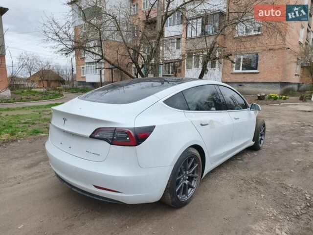 Белый Тесла Модель 3, объемом двигателя 0 л и пробегом 77 тыс. км за 9100 $, фото 4 на Automoto.ua
