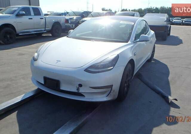 Белый Тесла Модель 3, объемом двигателя 0 л и пробегом 74 тыс. км за 15600 $, фото 2 на Automoto.ua