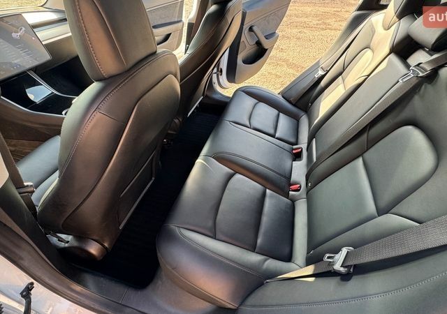 Білий Тесла Модель 3, об'ємом двигуна 0 л та пробігом 136 тис. км за 15950 $, фото 11 на Automoto.ua