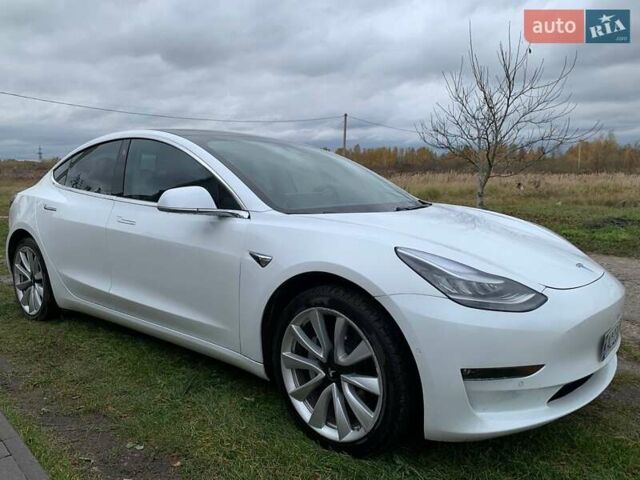 Белый Тесла Модель 3, объемом двигателя 0 л и пробегом 57 тыс. км за 17000 $, фото 2 на Automoto.ua