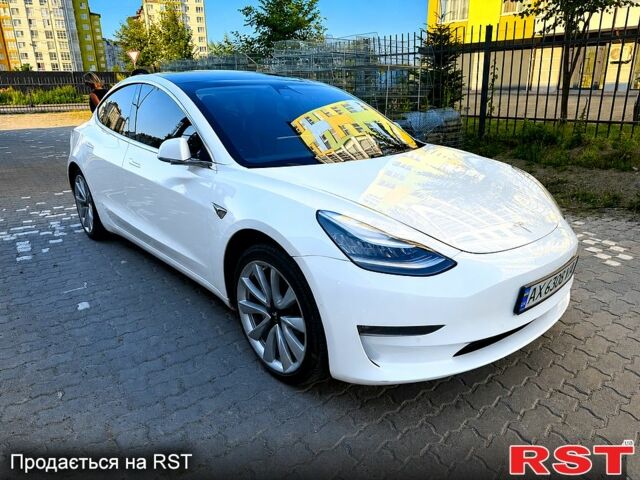 Білий Тесла Модель 3, об'ємом двигуна 0.32 л та пробігом 191 тис. км за 15400 $, фото 2 на Automoto.ua
