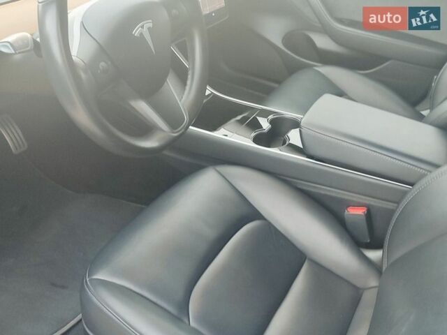 Белый Тесла Модель 3, объемом двигателя 0 л и пробегом 77 тыс. км за 19899 $, фото 7 на Automoto.ua