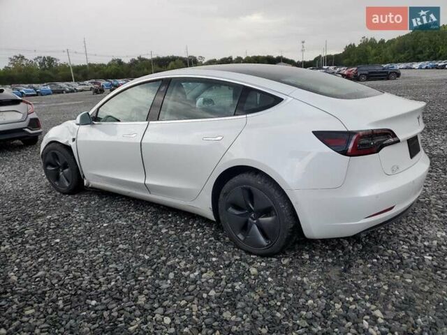 Белый Тесла Модель 3, объемом двигателя 0 л и пробегом 122 тыс. км за 6000 $, фото 1 на Automoto.ua