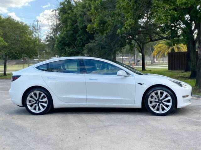 Білий Тесла Модель 3, об'ємом двигуна 0 л та пробігом 32 тис. км за 6100 $, фото 5 на Automoto.ua