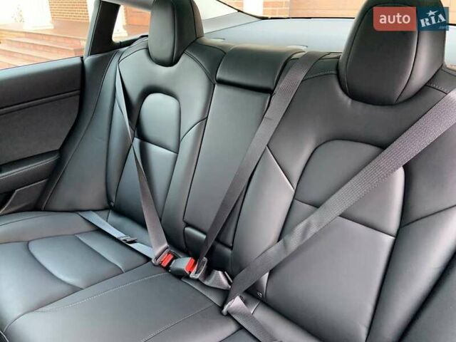 Белый Тесла Модель 3, объемом двигателя 0 л и пробегом 31 тыс. км за 32600 $, фото 30 на Automoto.ua